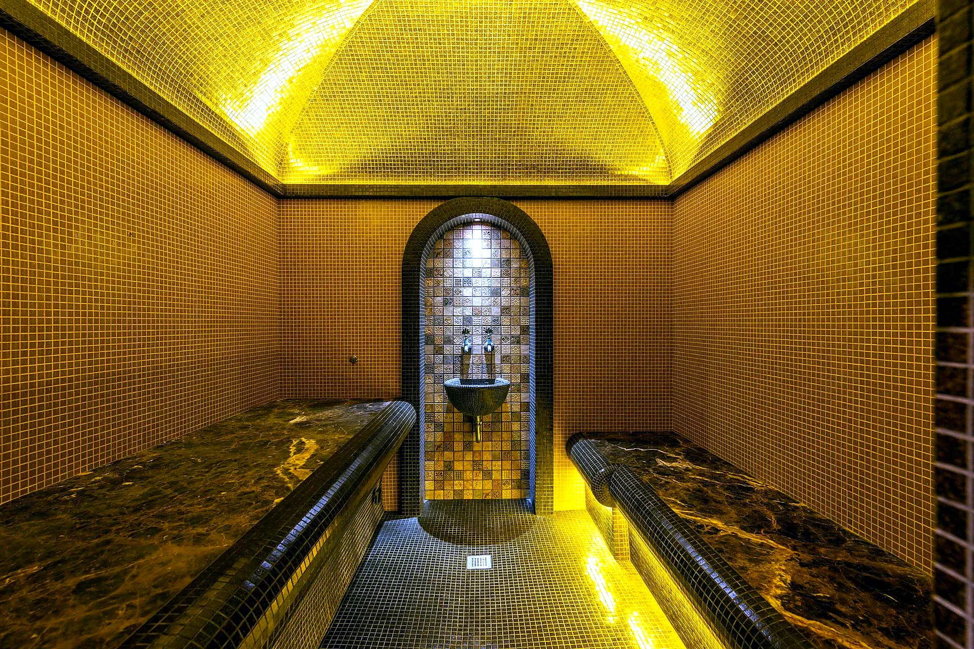 hammam in Seville tiled archway Moorish interior