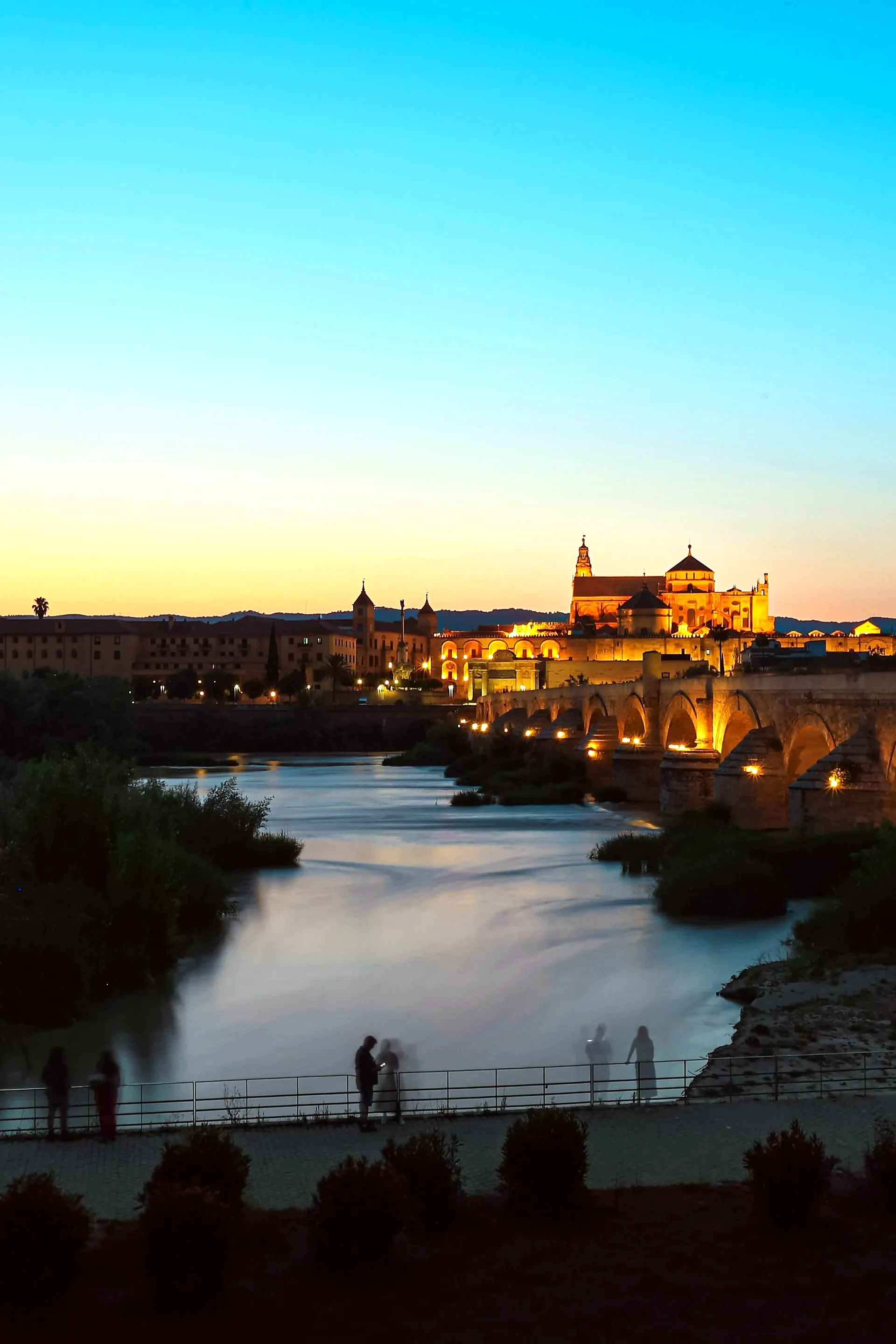 Seville sunset cruise Guadalquivir river golden hour Torre del Oro