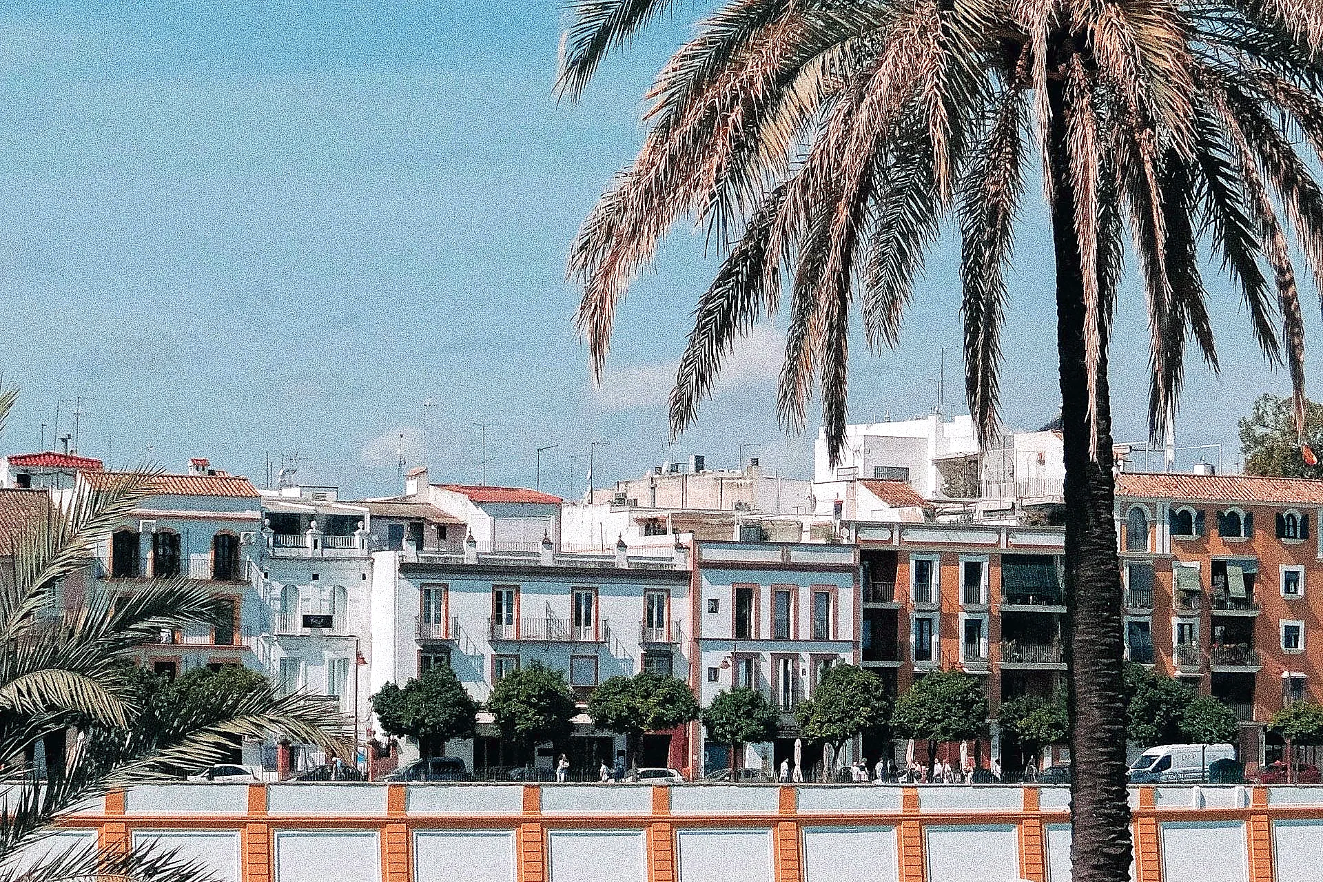 Cyclists riding along the Guadalquivir riverside path in Seville