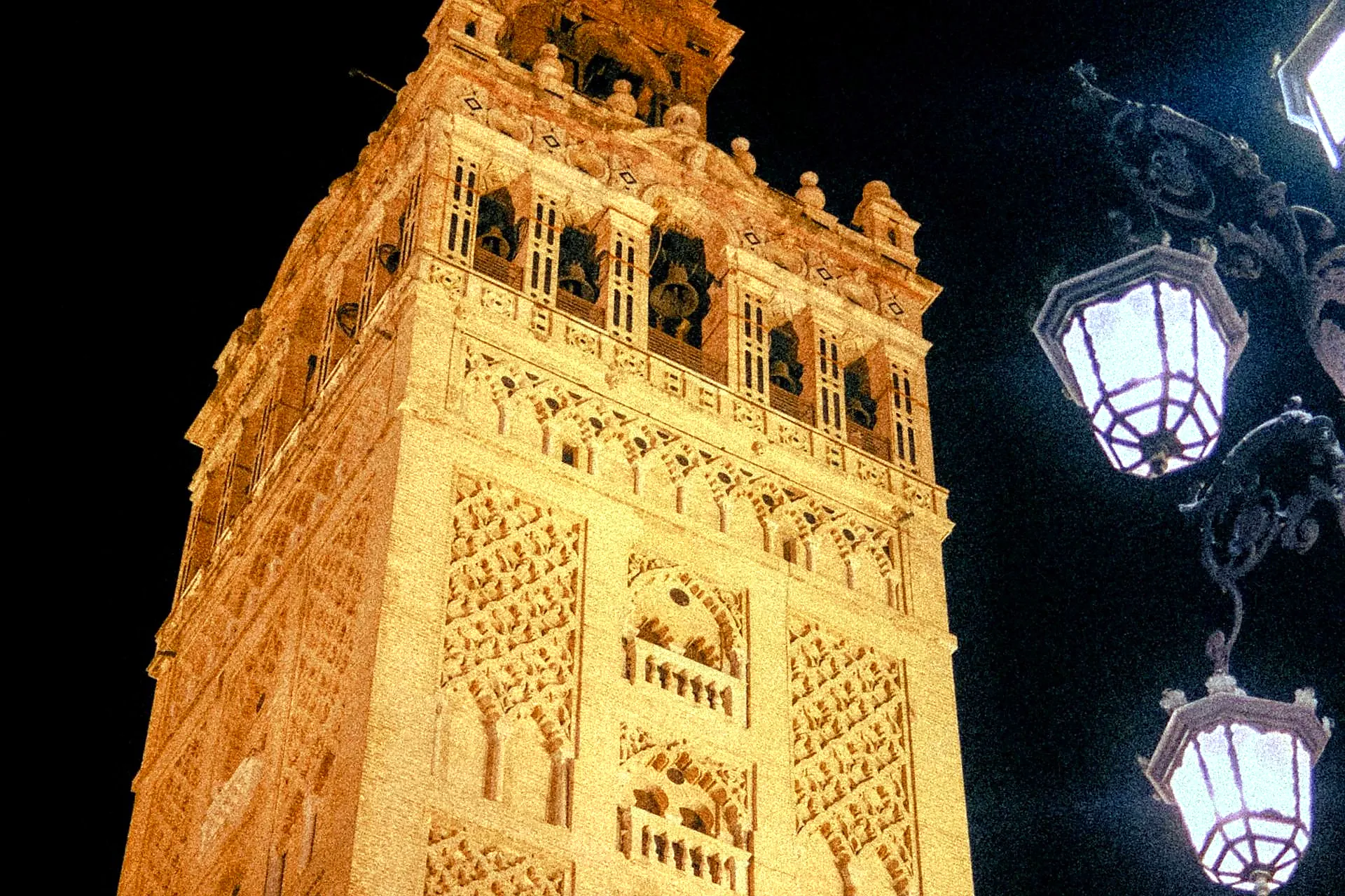 Evening guided tour at an illuminated monument in Seville - Night Tours in Seville