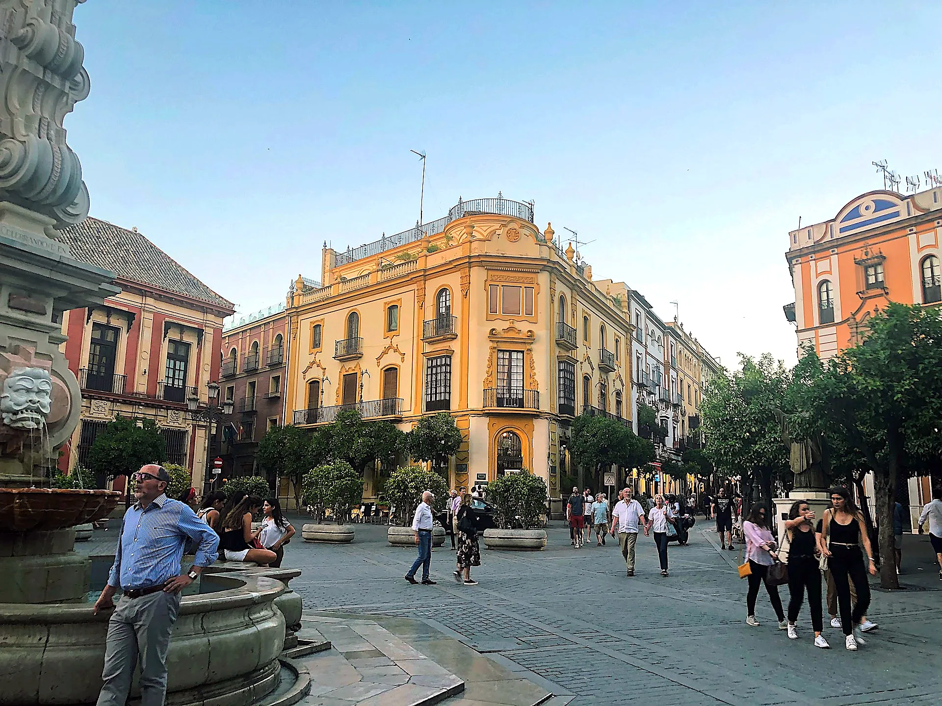 Tour group at a meeting point before a skip-the-line tour in Seville